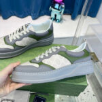 Sneakers moderne grigie e verdi con suola platforma, stile urbano e comfort everyday.