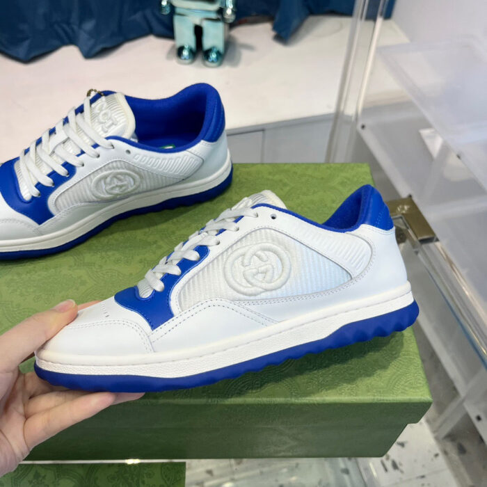 Sneakers di lusso sportive con dettagli moderni e accattivanti, perfette per stile e comfort.