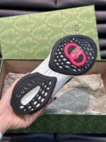 Scarpe sportive di lusso con suola dettagliata, brand elegante e packaging premium.