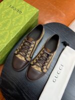 Sneakers Gucci di lusso con confezione esclusiva e design elegante in stile contemporaneo.