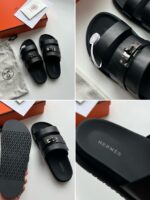 Sandali Hermès neri con fibbie in argento, design elegante e qualità premium.