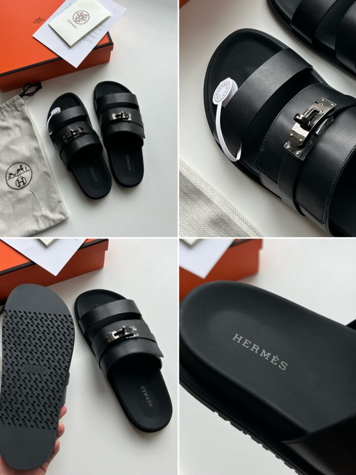 Sandali Hermès neri con fibbie in argento, design elegante e qualità premium.