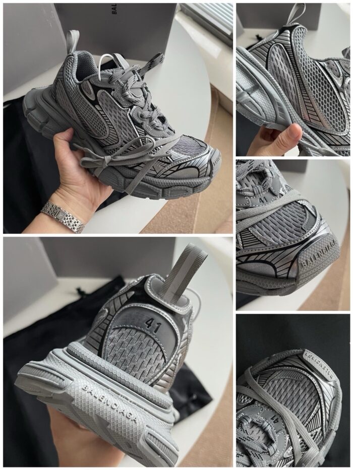Sneakers grigie chunky moderne con dettagli riflettenti, design versatile e suola robusta.