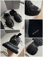 Sneakers Balenciaga nere moderne e sportive con suola chunky e dettagli di alta qualità.