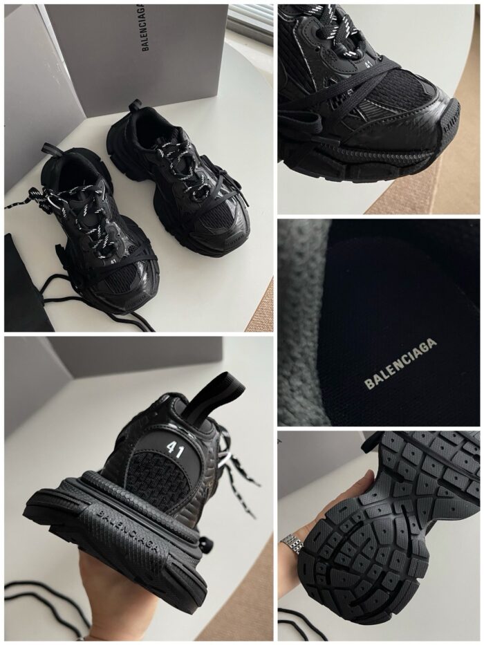 Sneakers Balenciaga nere moderne e sportive con suola chunky e dettagli di alta qualità.
