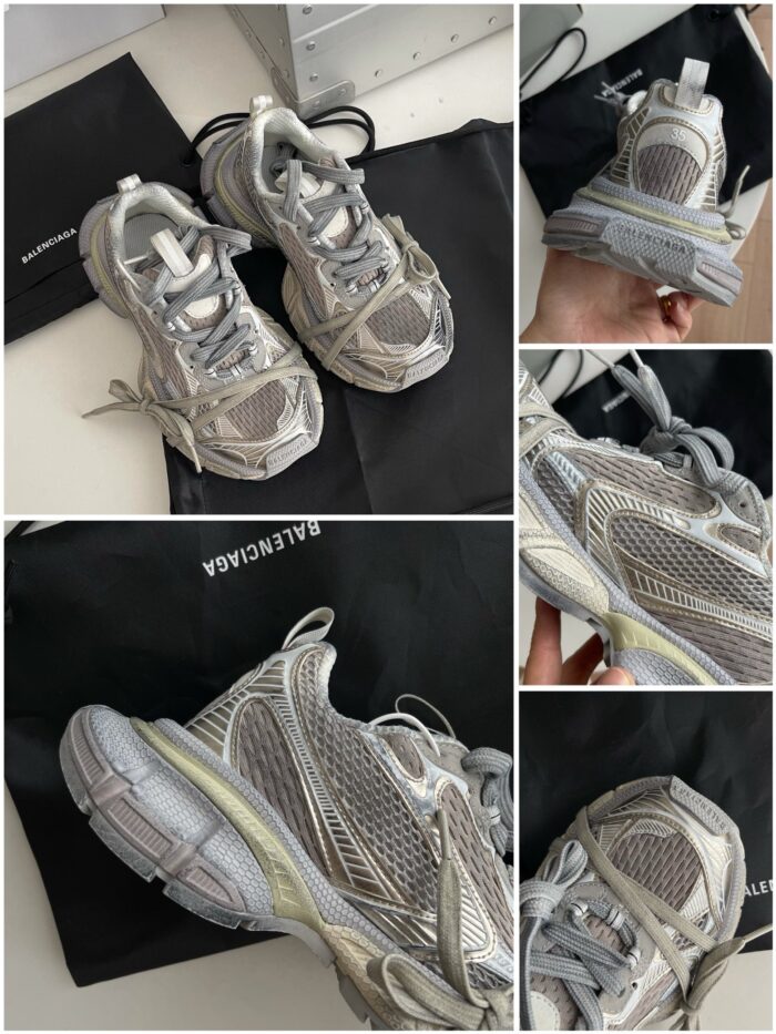 Scarpe da ginnastica moderne grigie con suola chunky e dettagli riflettenti, in sacchetto di pregio.