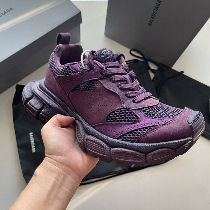 Sneaker viola di lusso con design moderno, comfort e dettagli premium per stile e performance.
