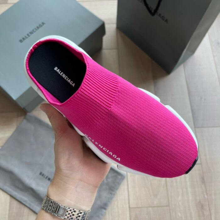 Sneaker Balenciaga rosa fluo con suola bianca, stile moderno e fashion casual.