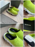 Sneaker neon verde Balenciaga, streetwear di lusso, comfort e design moderno su pavimento in legno.