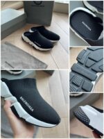 Scarpe Balenciaga clog nere con suola bianca moderna, comfort e stile contemporaneo.