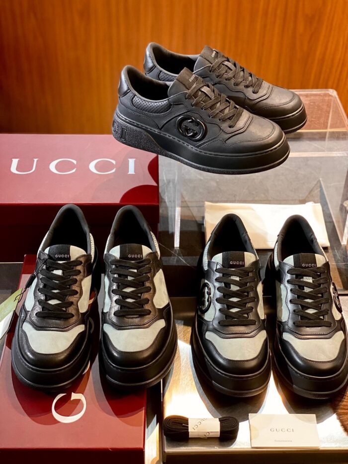 Scarpe sneakers di lusso Gucci in mostra, eleganti e versatili per ogni occasione.