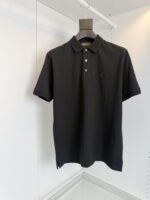 Maglietta polo nera elegante uomo, stile classico, tessuto premium, senza logo, perfetta per ogni occasione.