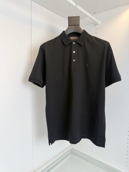 Maglietta polo nera elegante uomo, stile classico, tessuto premium, senza logo, perfetta per ogni occasione.