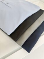 Pile di polo classiche colorate, casual e versatile per ogni occasione.