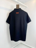 Maglietta polo nera classica, stile minimalista, morbida e versatile, perfetta per ogni look.