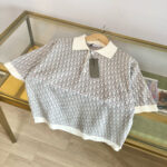 Camicia bianca elegante con motivo sottile, tessuto leggero, perfetta per occasioni semi-formali.