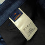 Etichetta jeans Made in Italy con istruzioni di cura e taglia 29