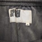 Etichetta brand Spete, taglia M, tessuto morbido e confortevole, ideale per abbigliamento sportivo.