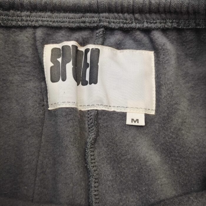 Etichetta brand Spete, taglia M, tessuto morbido e confortevole, ideale per abbigliamento sportivo.