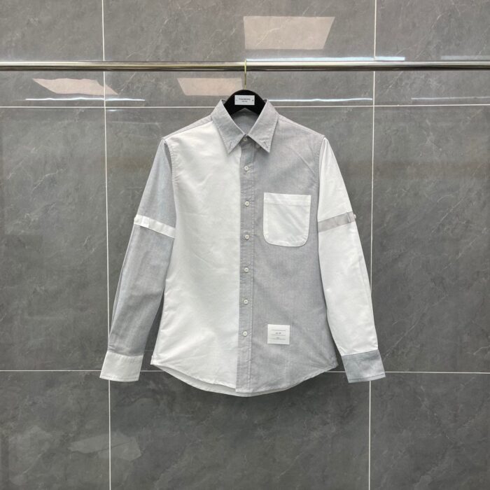 Camicia moderna a block color grigia con dettagli textured e stile elegante per ogni look.