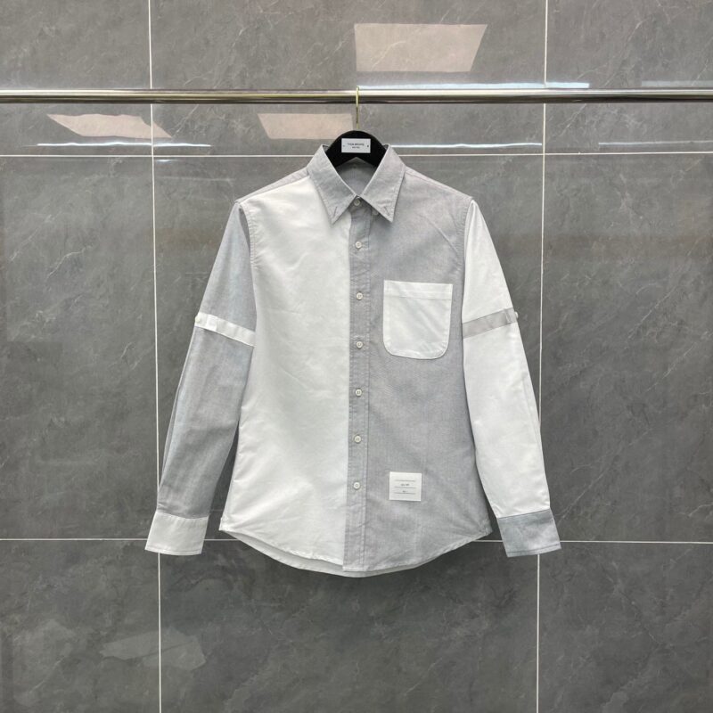 Camicia moderna a block color grigia con dettagli textured e stile elegante per ogni look.