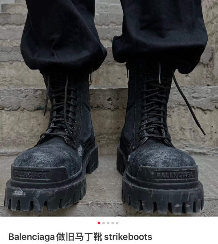 Stivali Balenciaga neri con suola robusta, stile urbano e design moderno.