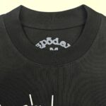 Maglietta nera in cotone con girocollo e tag “spodey”, taglia M, stile casual e versatile.