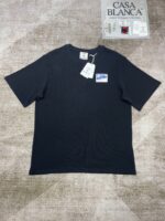 T-shirt nera casual con logo CASA BLANCA, stile minimalista e design versatile.