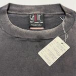 Maglietta nera in cotone con etichetta XL, stile casual e comfort moderno.