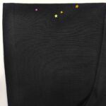 Leggings neri con stelle colorate, design divertente, comodi e perfetti per uno stile casual.