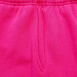 Pantaloni rosa acceso in cotone con vita elasticizzata, perfetti per comfort e stile casual.