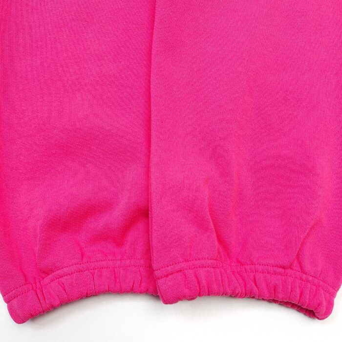 Pantaloni sportivi rosa con elastico alle caviglie, comodi e vivaci per il casual e lo sport.