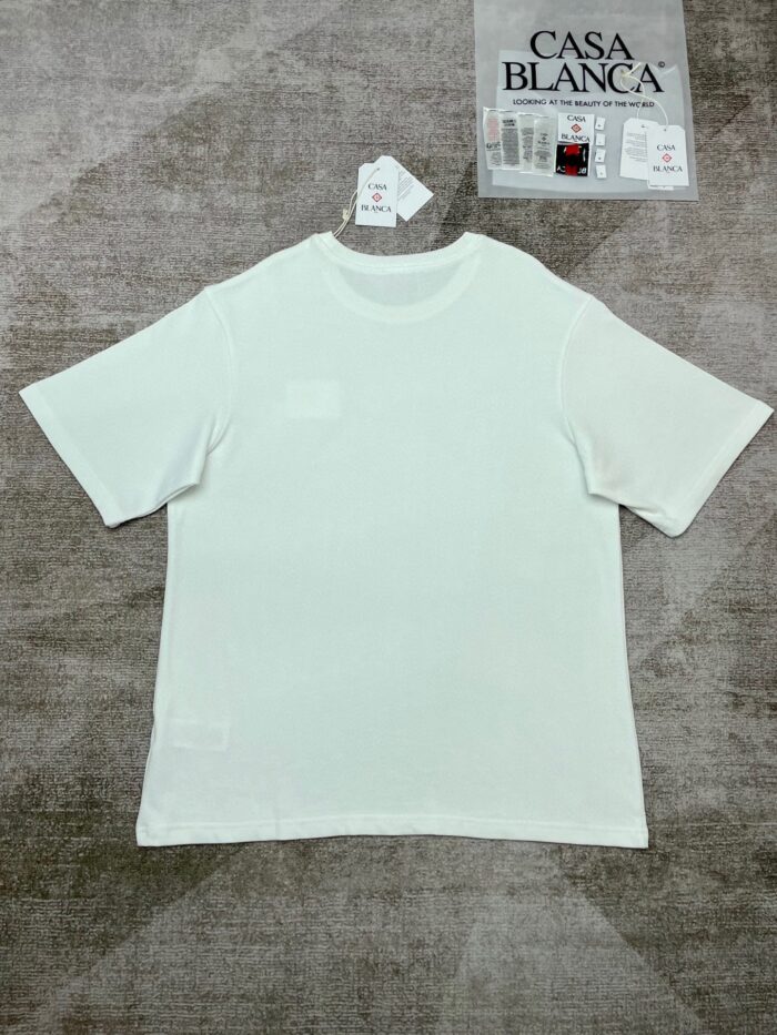 T-shirt bianca casual in cotone, logo CASA BLANCA, stile versatile e moderno.