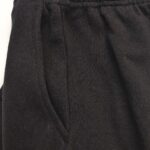 Pantaloni jogger neri con tasca laterale, elasticizzati e comodi per sport e relax.