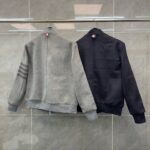 Giaccas casual in grigio e blu navy eleganti e sportive, stile moderno e versatile.