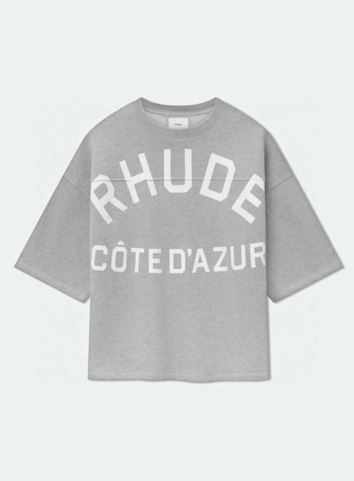 Maglietta grigia casual con logo Rhude e Côte dAzur, stile sportivo e trendy.