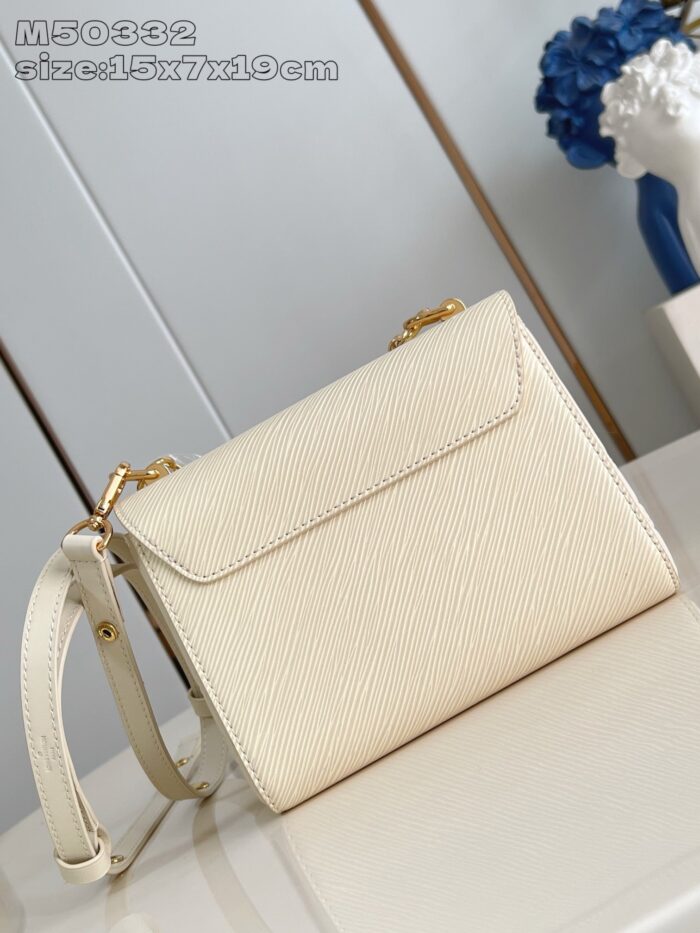 Borsa elegante bianca in pelle con tracolla removibile, stile moderno e raffinato.