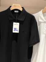 Polo nere e bianche classiche, eleganti e di qualità, perfette per ogni stile e occasione.