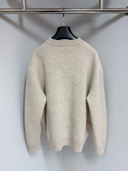 Maglione casual donna color crema vista retro, morbido e comodo con dettagli a costine.