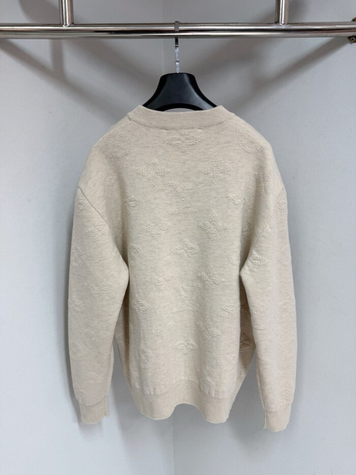 Maglione casual donna color crema vista retro, morbido e comodo con dettagli a costine.