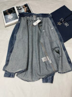 Giacchetto denim Dior di lusso con dettagli esclusivi e stile raffinato.