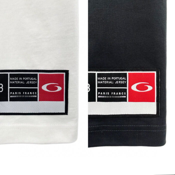 Tessuti jersey bianco e nero con etichette di marca Made in Portugal e stile moderno.