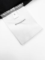 Etichetta Givenchy su tessuto nero, tag elegante e di alta qualità.