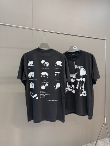 Magliette nere con grafiche artistiche moderne, stile streetwear e design narrativi distintivi.