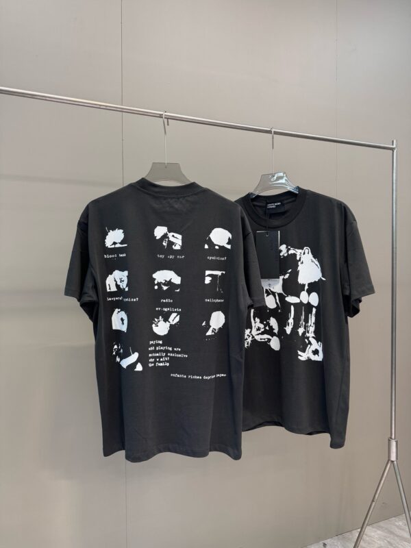 Magliette nere con grafiche artistiche moderne, stile streetwear e design narrativi distintivi.