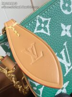 Borsa Louis Vuitton verde con monogramma, dettagli in pelle e finiture oro eleganti.