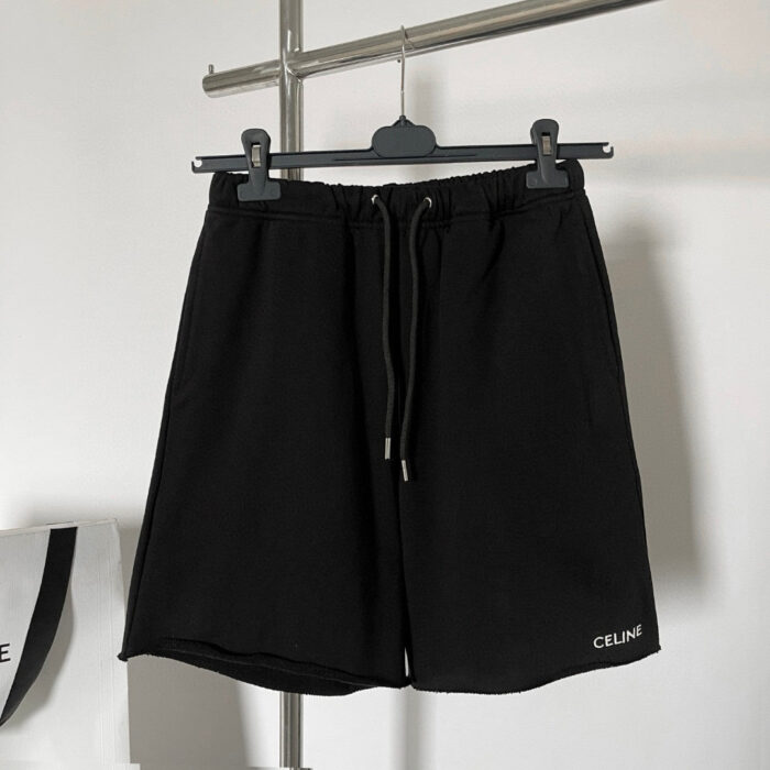 Shorts neri Céline di lusso con logo minimalista, stile moderno e casual.