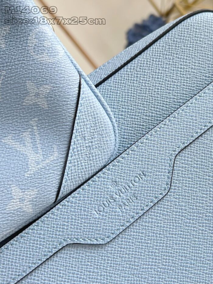 Borsa Louis Vuitton in pelle blu con motivo monogramma, elegante e di alta qualità.