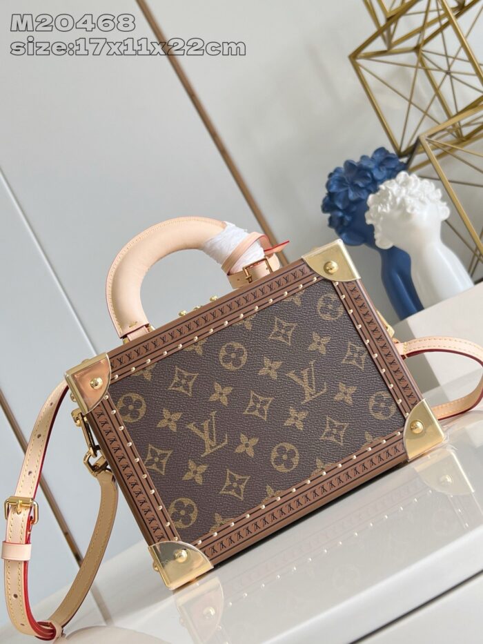 Borsa Louis Vuitton monogramma in pelle marrone con dettagli in ottone e tracolla removibile elegante.