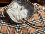 Pantaloncini da mare luxury con motivo checkered, elastico e laccio regolabile.